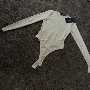 Pretty Little Thing peach long sleeve body suit